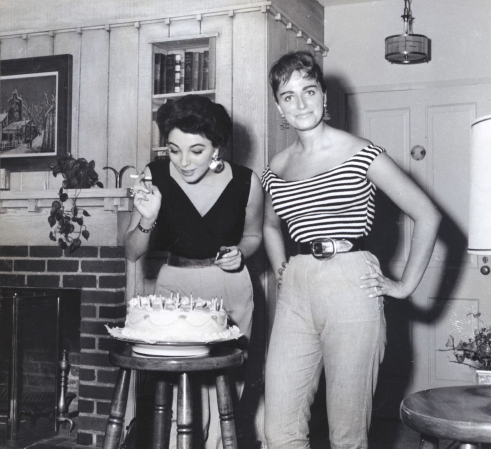 Collins, seen here with sister Joan in California around 1956, added that "to be successful you have to write about what you know. (And) whether I'm lucky or unlucky enough to know a lot about Hollywood, it's what I like to write about."