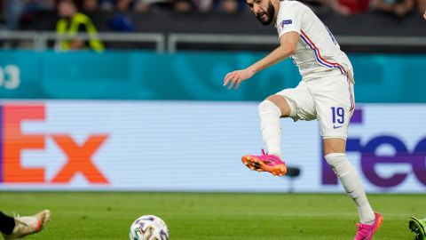 Benzema scores past Portugal's goalkeeper Rui Patricio.
