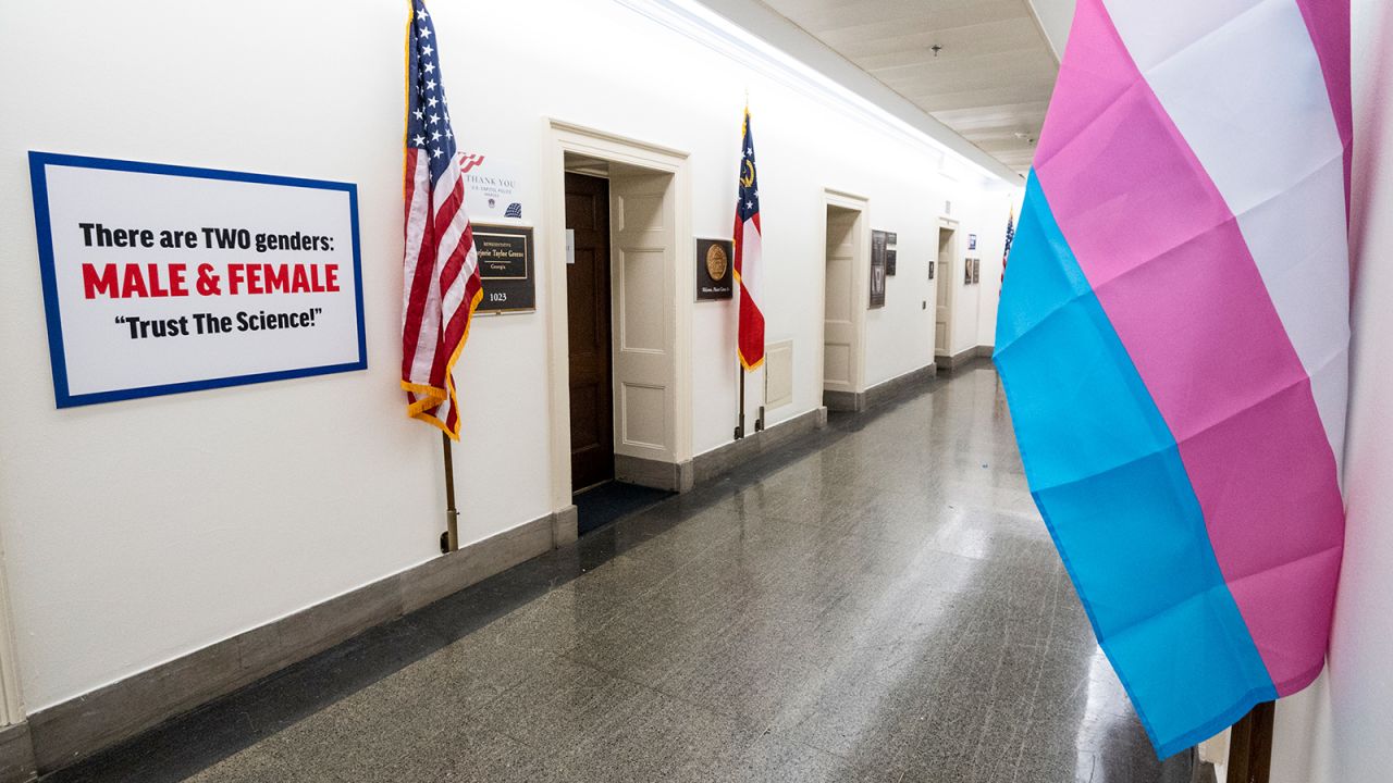  A transphobic sign was put up by Rep. Marjorie Taylor Greene, R-Ga., after Rep. Marie Newman, D-Ill., put up a pro transgener rights flag across the hallway in the Longworth House Office Building. 