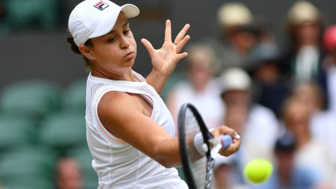 Barty hits a return against Harriet Dart at Wimbledon in 2019. 