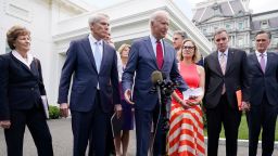 President Joe Biden, with a bipartisan group of senators, speaks Thursday June 24, 2021, outside the White House in Washington. Biden invited members of the group of 21 Republican and Democratic senators to discuss the infrastructure plan. 