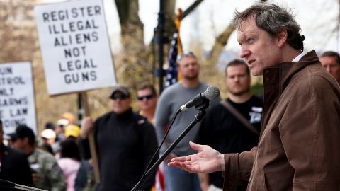 John Lott, author of "More Guns, Less Crime," speaks at a gun rights rally at the Connecticut State Capitol in Hartford on April 20, 2013. 
