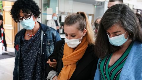 Valerie Bacot, center, arrives with relatives at the Chalon-sur-Saone courthouse, central France, on Thursday, June 24, 2021.