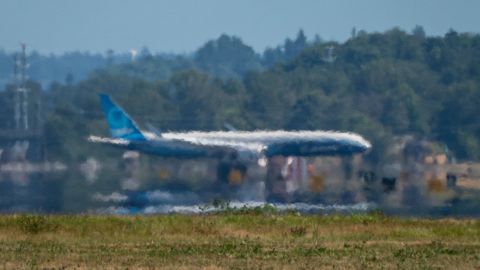 Heat eminates from a runway at Boeing Field in Seattle.