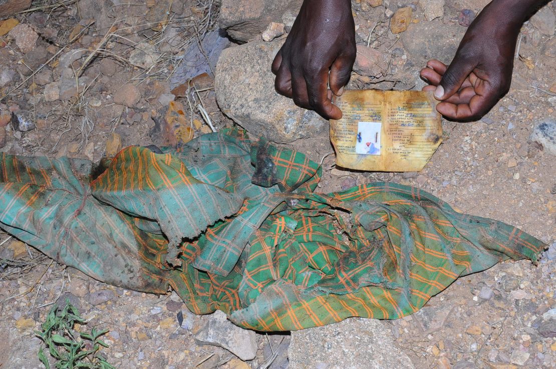 One photograph from the scene of clothing and an ID card left at the scene of the massacre in Mahibere Dego, Tigray.