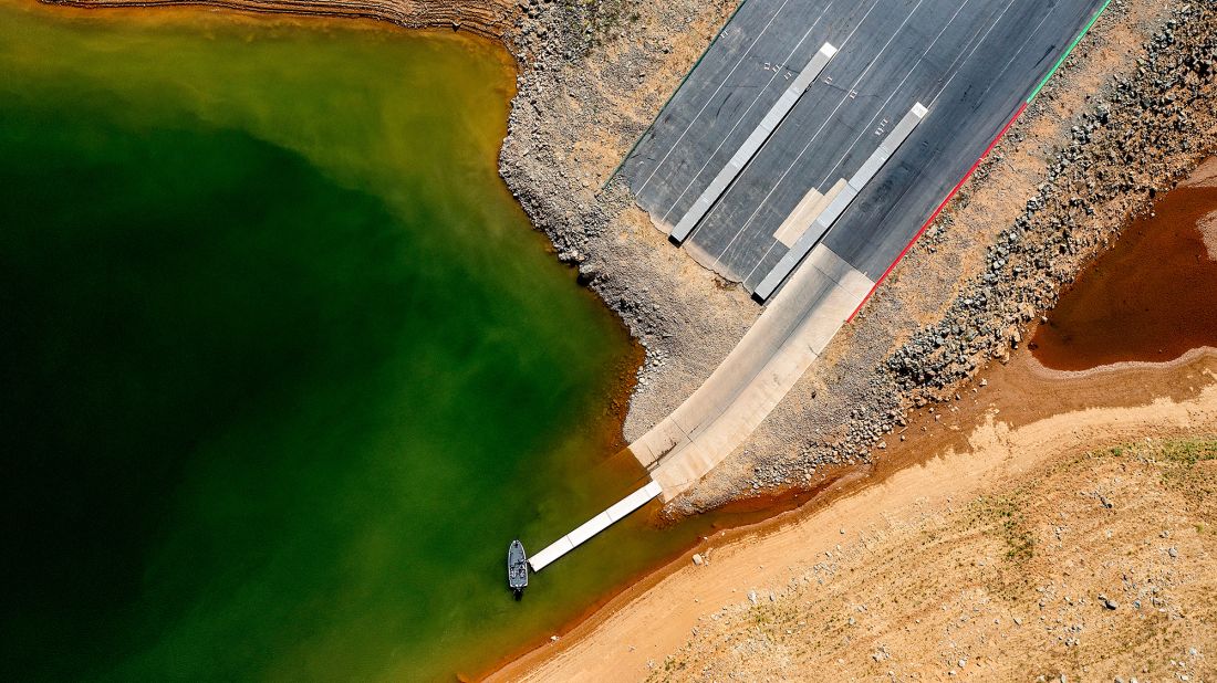 A launch ramp, extended to accommodate low water levels, stretches into California's Lake Oroville on May 22. At the time of this photo, the reservoir was at 39% of capacity and 46% of its historical average.