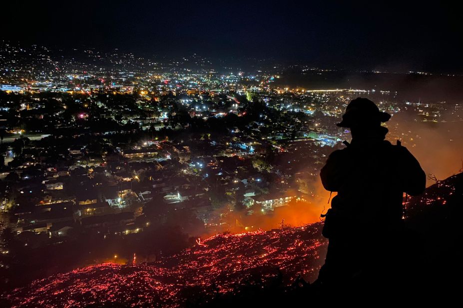 Firefighters battle a brushfire in Santa Barbara, California, on May 21.