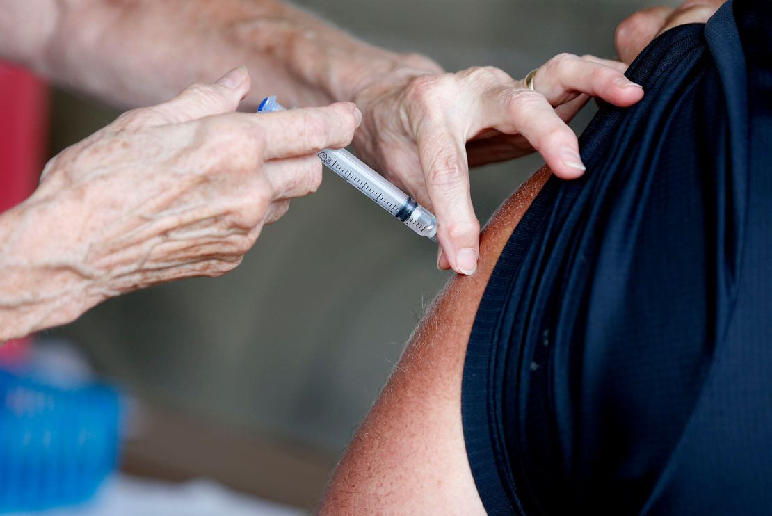 A man receives a Covid-19 vaccine at a clinic in Greene County, Missouri, on June 22. The county is seeing an average of 94 new Covid-19 cases per day, 93 percent of which are the Delta variant, officials said.