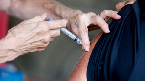 A man receives a Covid-19 vaccine at a clinic in Greene County, Missouri, on June 22. The county is seeing an average of 94 new Covid-19 cases per day, 93 percent of which are the Delta variant, officials said.