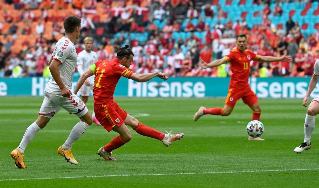 Bale shoots at goal against Denmark.
