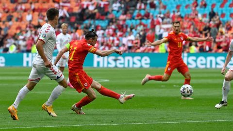 Bale shoots at goal against Denmark.