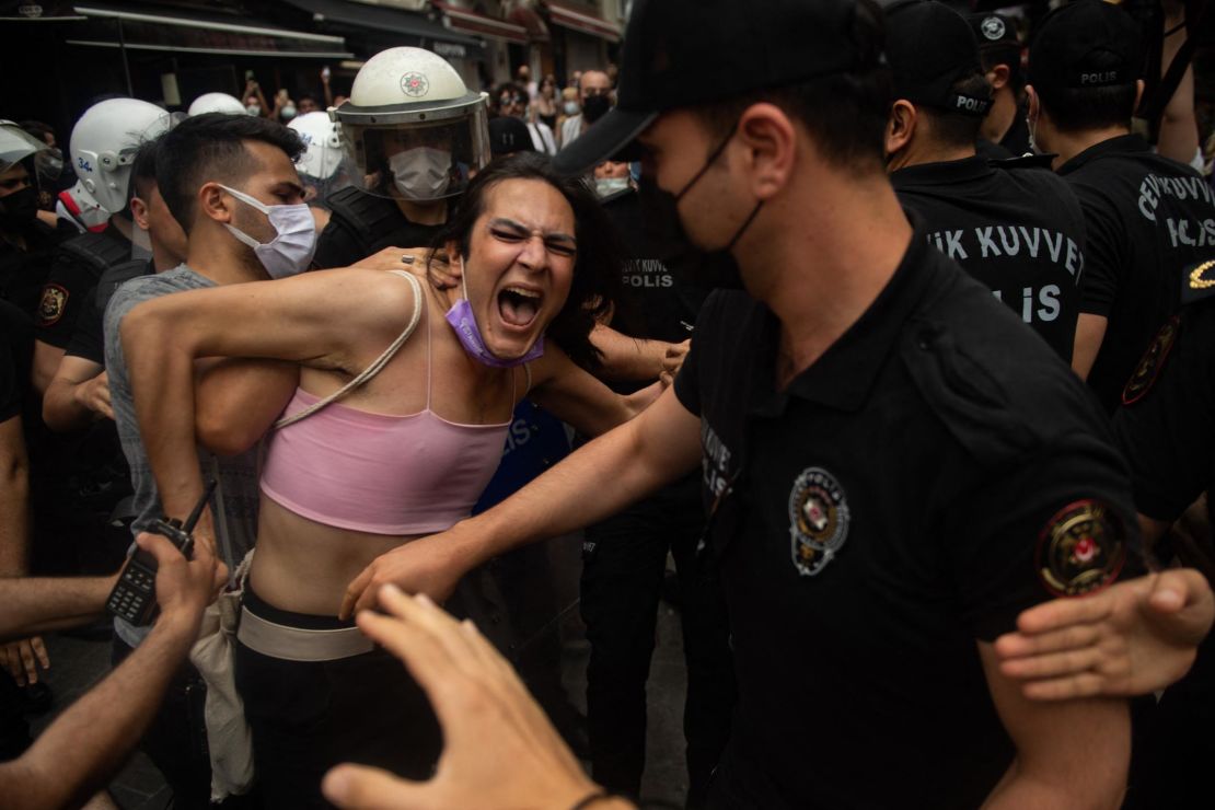 A protester is detained by police at the Pride event in Istanbul on Saturday.