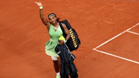 Williams waves goodbye to the crowd after her straight sets defeat  to Elena Rybakina at the 2021 French Open.