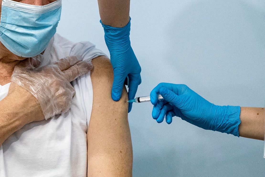A medical worker administers a shot of Sputnik V to a patient in a vaccination center in Moscow in January.