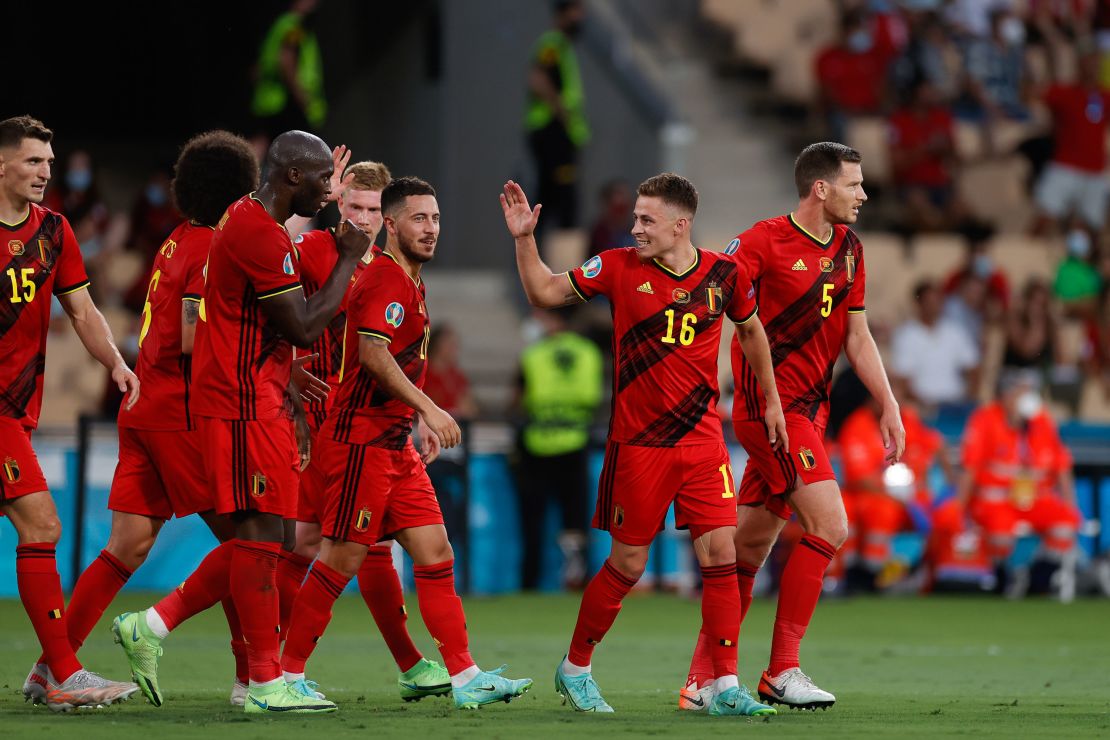 Hazard celebrates with his  teammates after scoring against Portugal. 