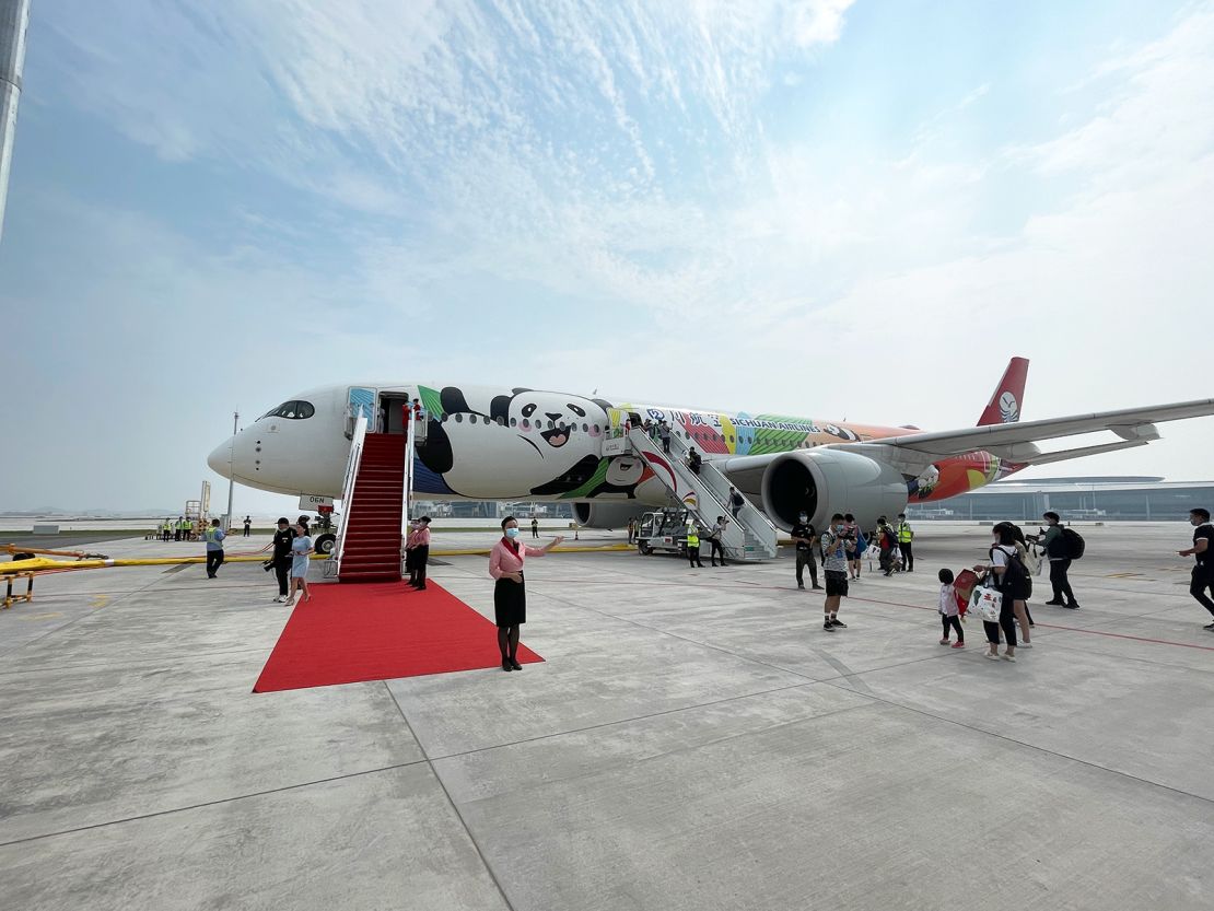 Passengers prepare to board an airplane at Chengdu Tianfu International Airport on June 27. 