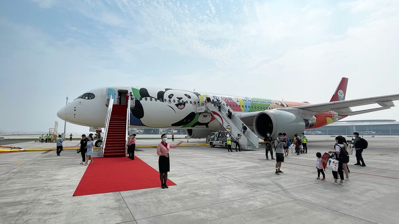 Passengers prepare to board an airplane at Chengdu Tianfu International Airport on June 27. 