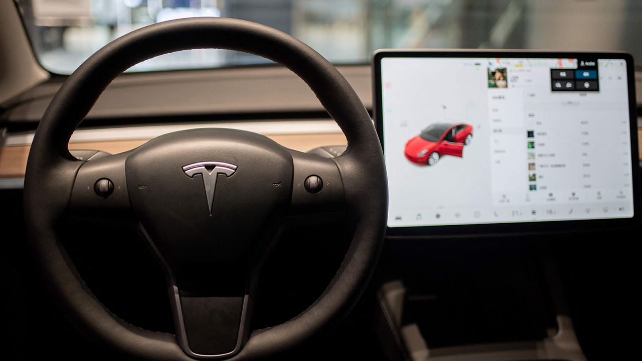 The interior of a Tesla Model 3 seen at a Tesla shop in a shopping Mall in Beijing on May 26.