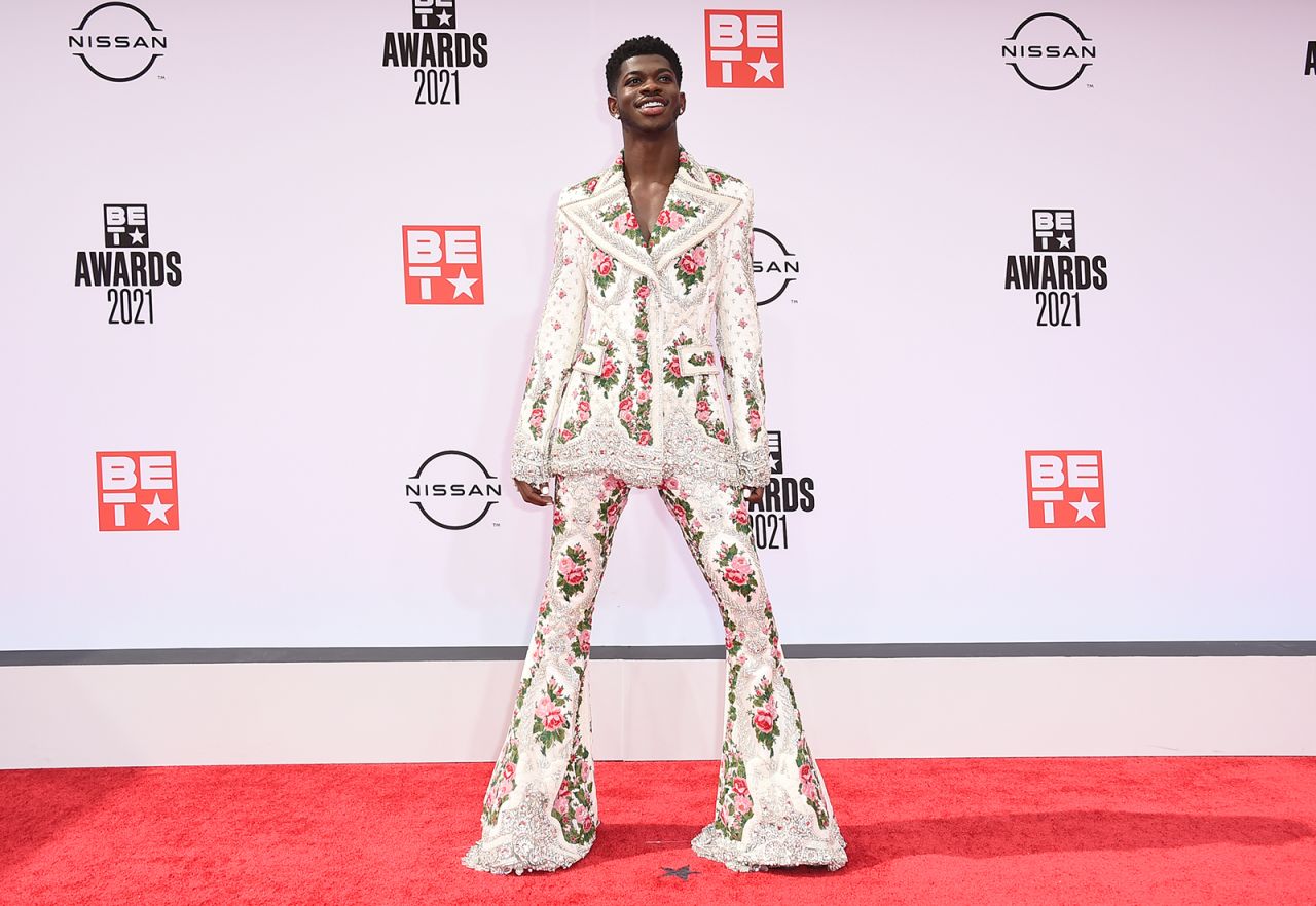 Lil Nas X wearing a Richard Quinn floral embroidered suit to the 2021 BET Awards. 