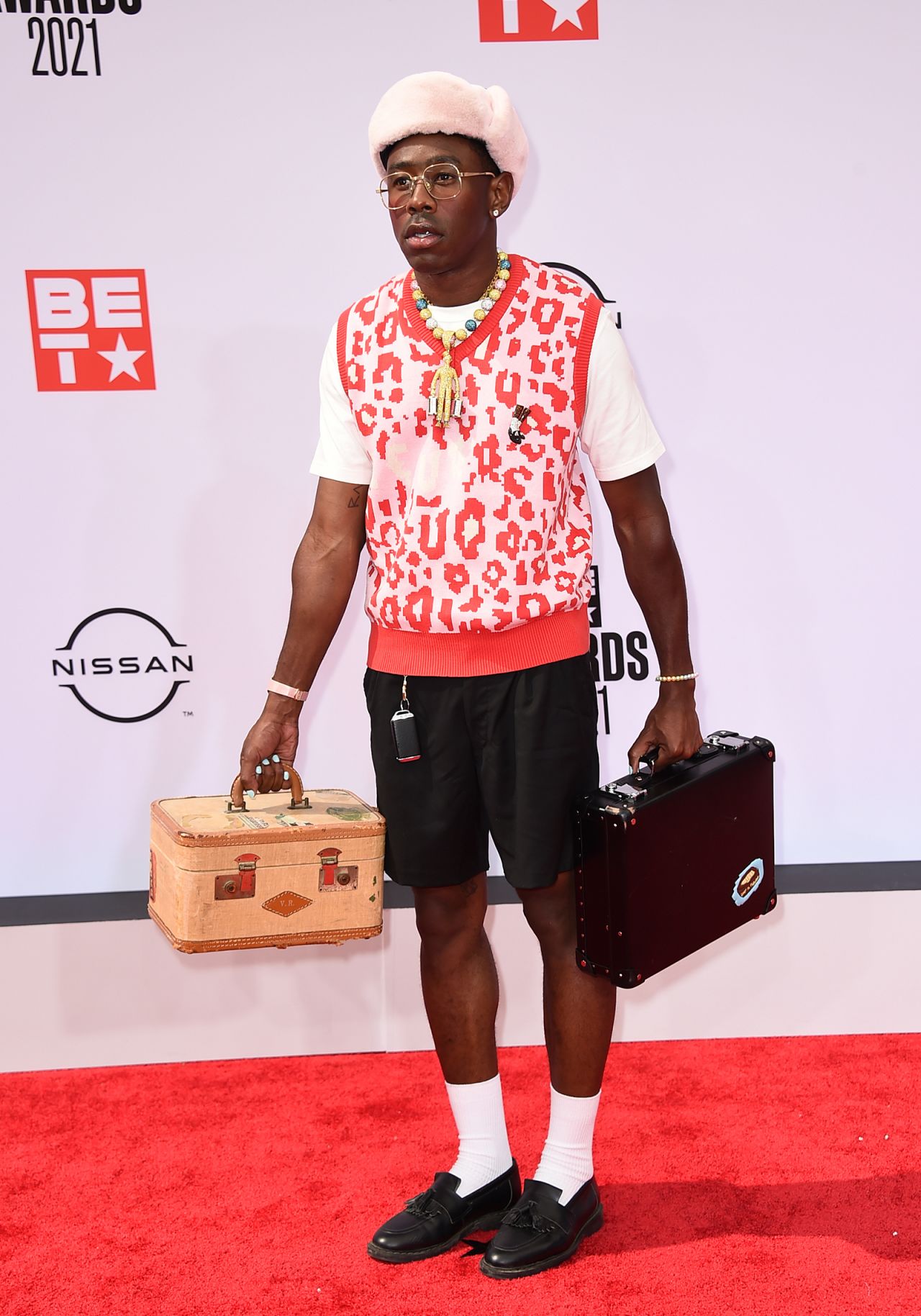 Lil Nas X wows BET Awards 2021 red carpet in elaborate gown | CNN