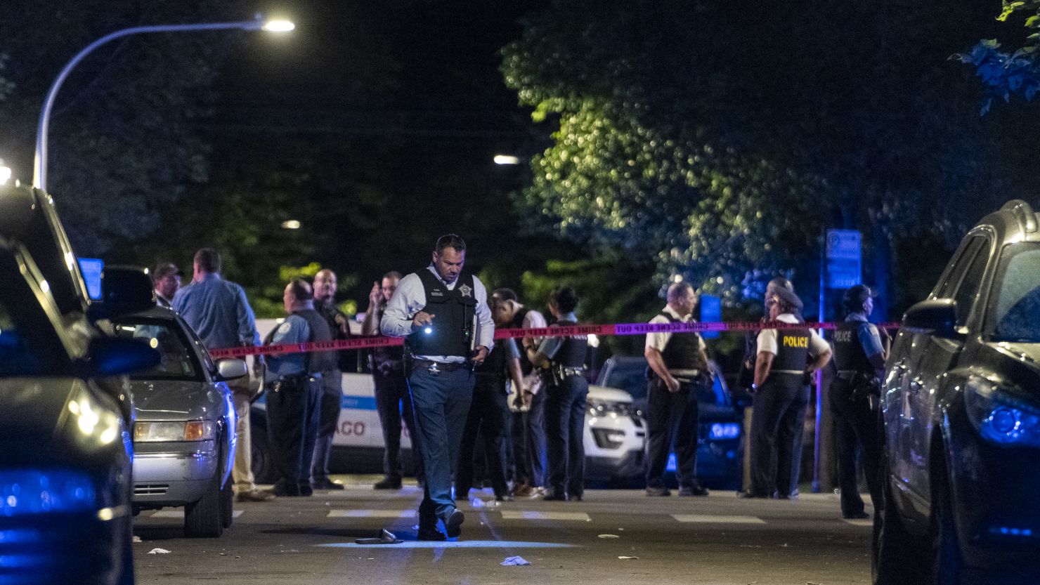 Chicago police respond to the scene of a shooting Sunday.