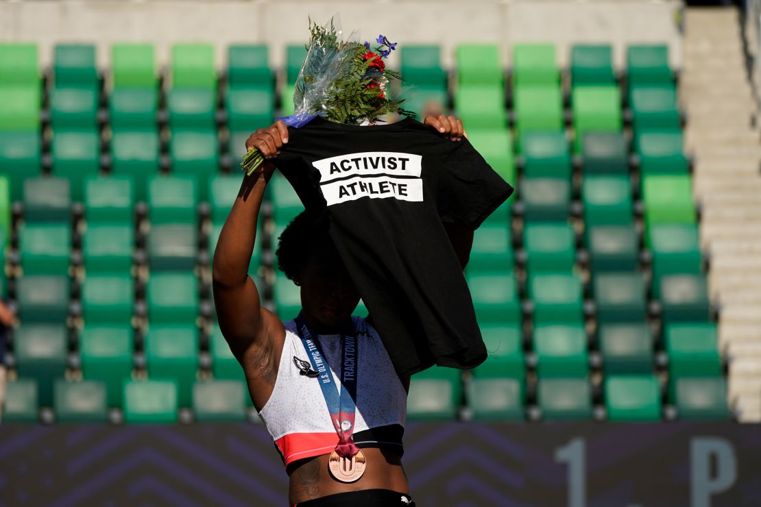 Berry displays a T-shirt during her podium protest at the Olympic trials.