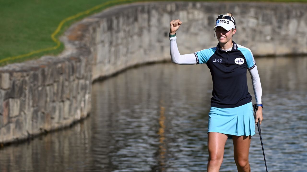 Nelly Korda reacts to her putt on the 18th green as she celebrates winning the Women's PGA Championship golf tournament.