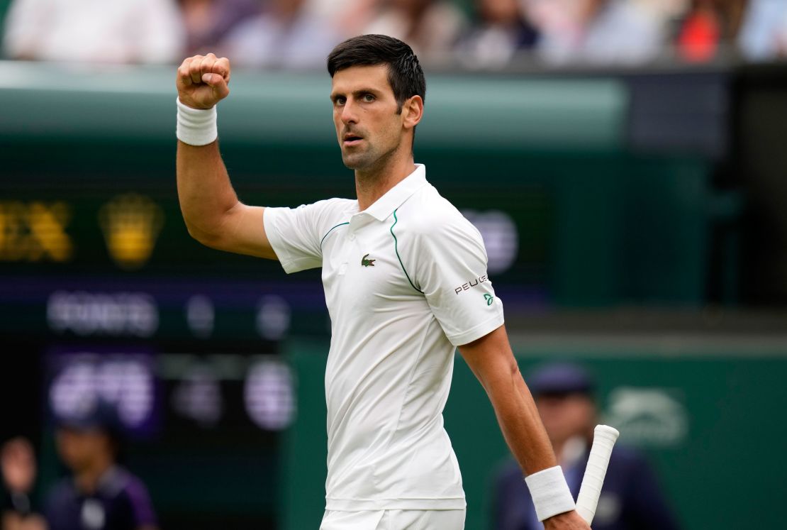 Djokovic celebrates a point during the men's singles match against Draper.