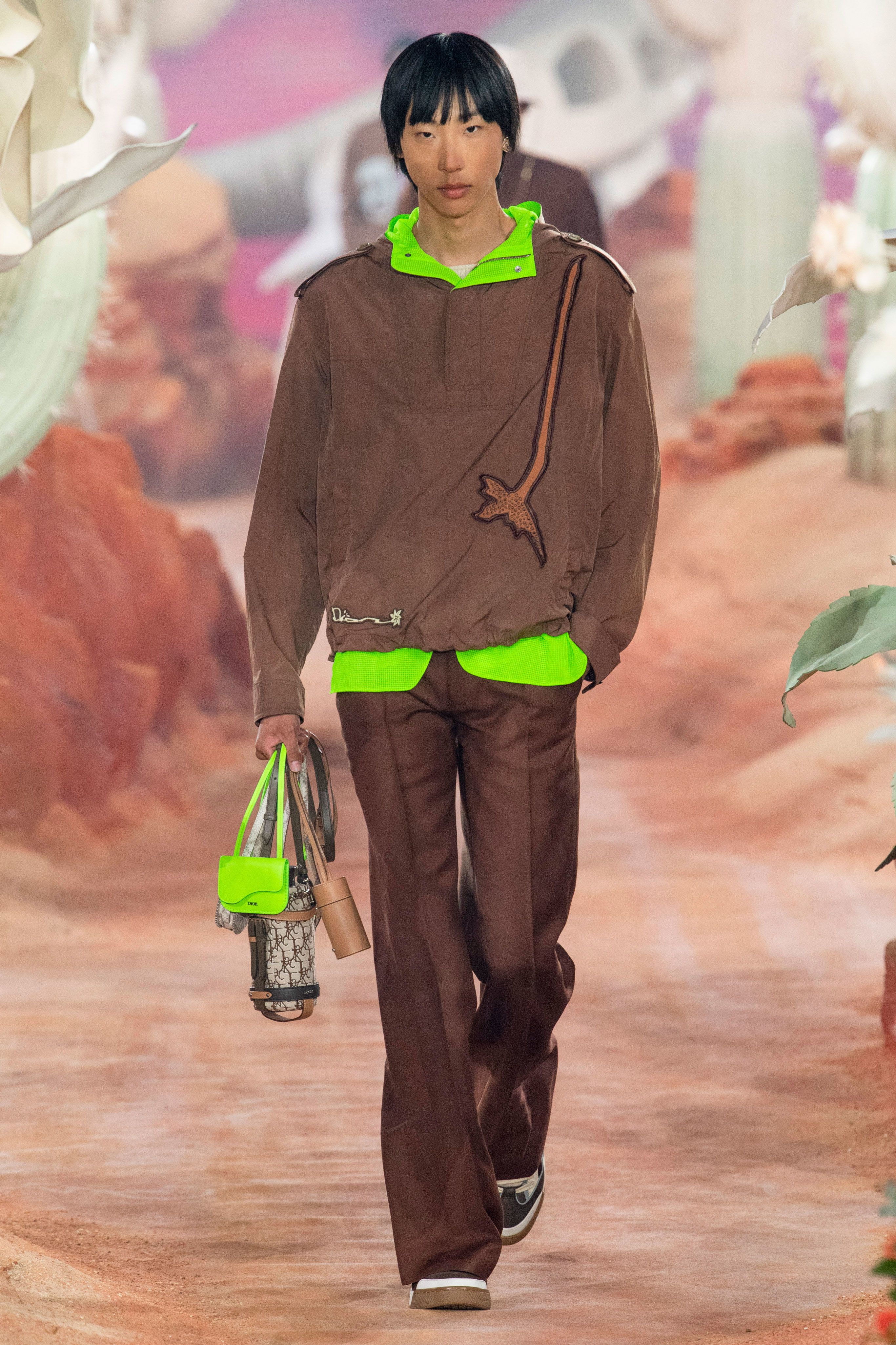 Louis Vuitton model in harness Spring/Summer 2019 collection at Paris  Fashion Week