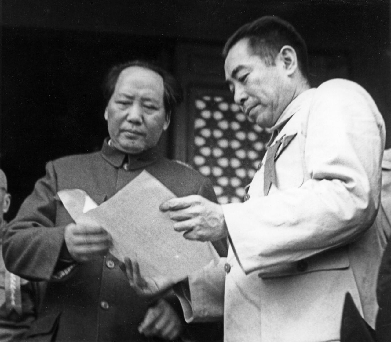 Mao, left, and Zhou Enlai attend the founding ceremony of the People's Republic of China in October 1949, after the Communists defeated the Nationalists in the civil war. Mao named himself head of state and Zhou became premier.<br /><br />The defeated Nationalists, led by Chiang Kai-shek, fled to the island of Taiwan.