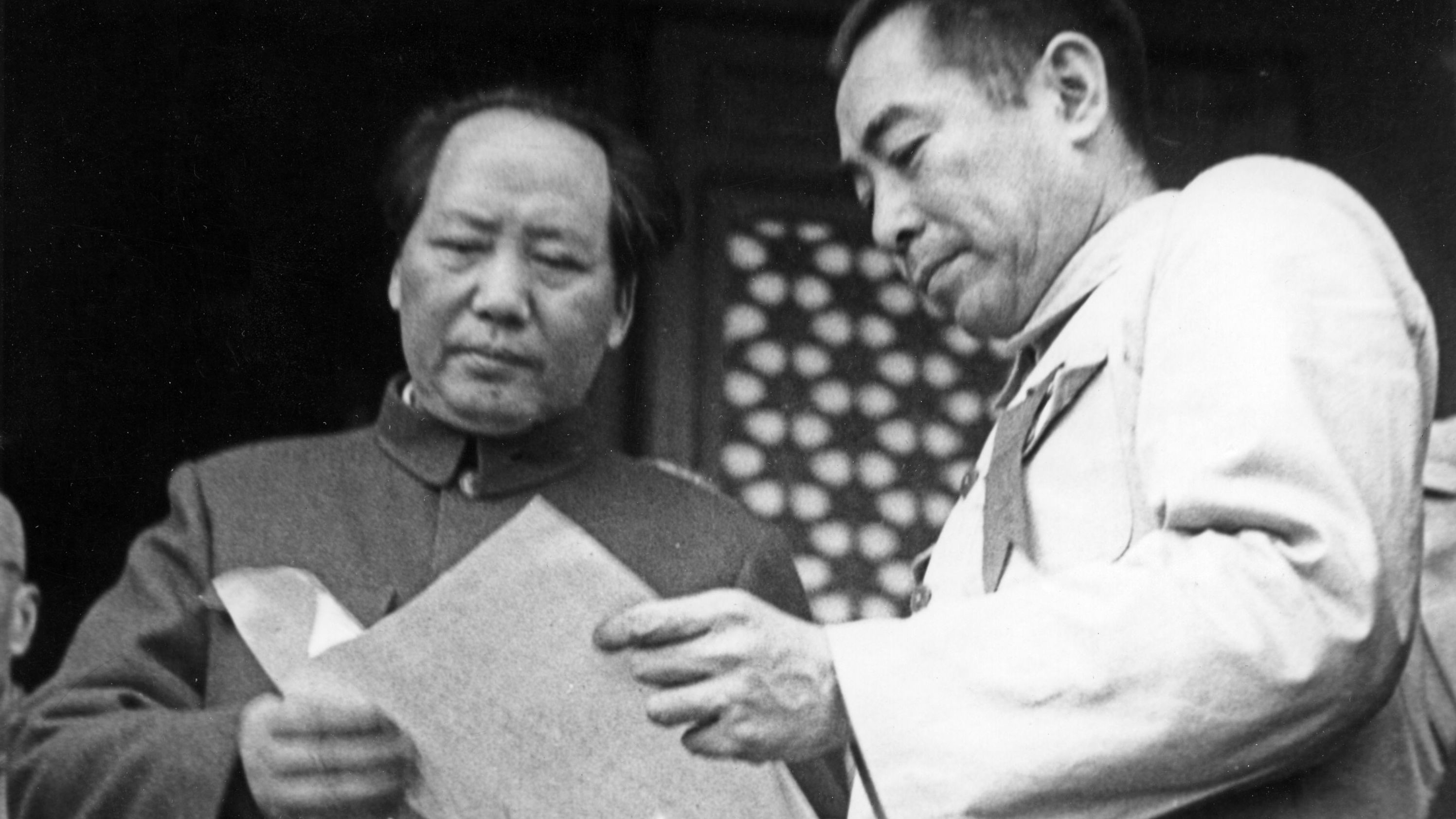 Mao, left, and Zhou Enlai attend the founding ceremony of the People's Republic of China in October 1949, after the Communists defeated the Nationalists in the civil war. Mao named himself head of state and Zhou became premier.<br /><br />The defeated Nationalists, led by Chiang Kai-shek, fled to the island of Taiwan.