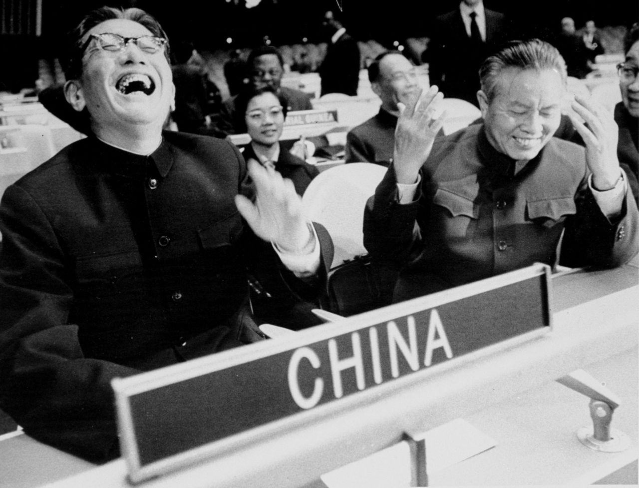 In 1971, the People's Republic of China was recognized by the United Nations as the rightful representative of China. Here, Chinese Foreign Minister Qiao Guanhua, left, and UN Representative Huang Hua laugh as they take their seats at the United Nations General Assembly for the first time.