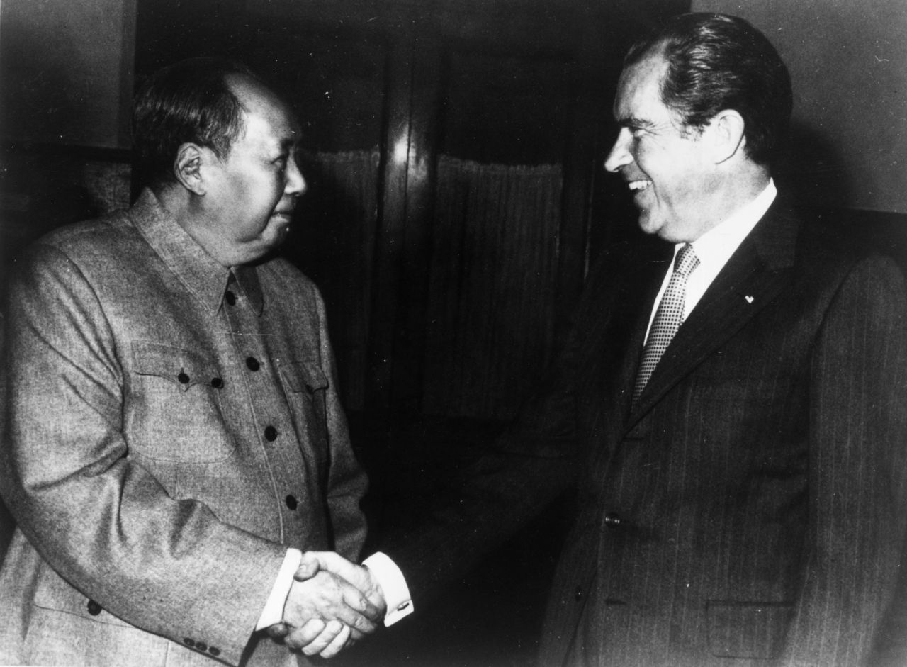 Mao shakes hands with US President Richard Nixon, who was visiting China in 1972. Nixon was the first US president to visit China following the 1949 revolution.
