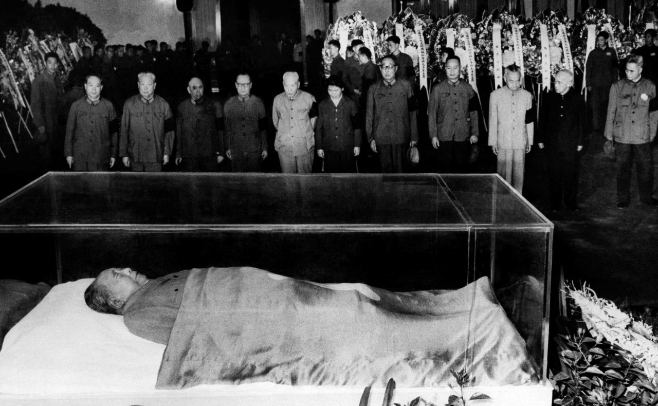 Party and state leaders pay their respects to Mao in 1976. There was a brief power struggle after Mao's death, which ultimately led to the rise of Deng Xiaoping in 1978. Deng's vision would move China to embrace market reforms and capitalism, under the title of "socialism with Chinese characteristics."