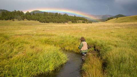 A rainbow hangs over the fields of Los Alamos County, New Mexico in the fall of 2016.