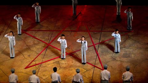 Young performers salute around the symbol of a red star during a rehearsal of "Yan'an Nursery" before its premiere in Yan'an, China, in 2011. Yan'an is celebrated as the birthplace of China's Communist revolution.