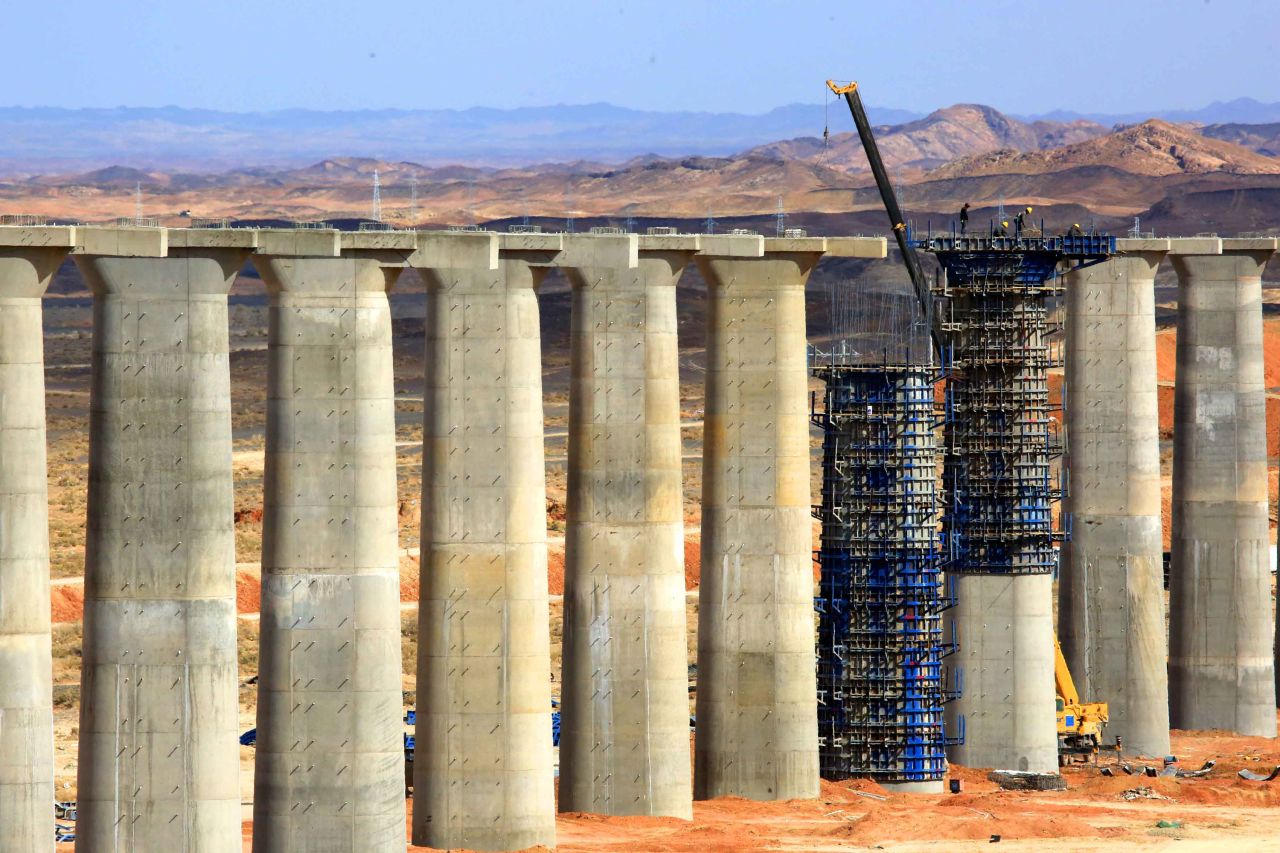 Workers construct piers for the Ejin-Hami railway in Jiuquan, China, in May 2015. <a href="https://www.cnn.com/travel/article/china-high-speed-rail-cmd/index.html" target="_blank">China has built the world's largest network of high-speed railways,</a> with 37,900 kilometers (about 23,500 miles) of lines linking all of its major mega-city clusters. This has all been completed since 2008.