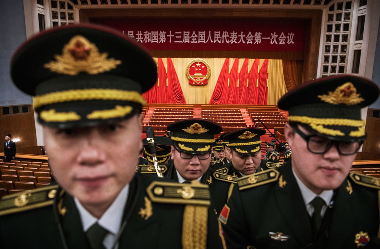 Members of a Chinese army band leave the Great Hall of the People after the closing session of the National People's Congress in March 2018.