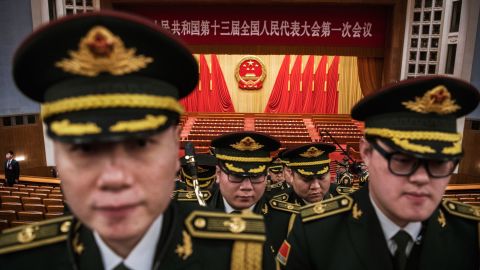 Members of a Chinese army band leave the Great Hall of the People after the closing session of the National People's Congress in March 2018.