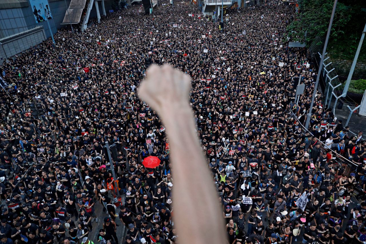 People march in the streets of Hong Kong <a href="http://www.cnn.com/2019/06/09/world/gallery/hong-kong-extradition-protest/index.html" target="_blank">to protest a controversial extradition bill</a> in June 2019. Critics feared the bill would allow citizens to be sent across the border into mainland China. Hong Kong Chief Executive Carrie Lam ultimately withdrew the bill first introduced in April 2019, but she refused to give ground on protesters' four other demands, which included greater democracy for the city and an independent commission into police conduct.