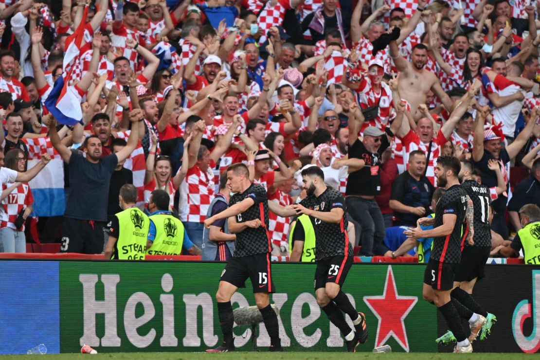 Mario Pasalic celebrates after equalizing for Croatia in stoppage time.