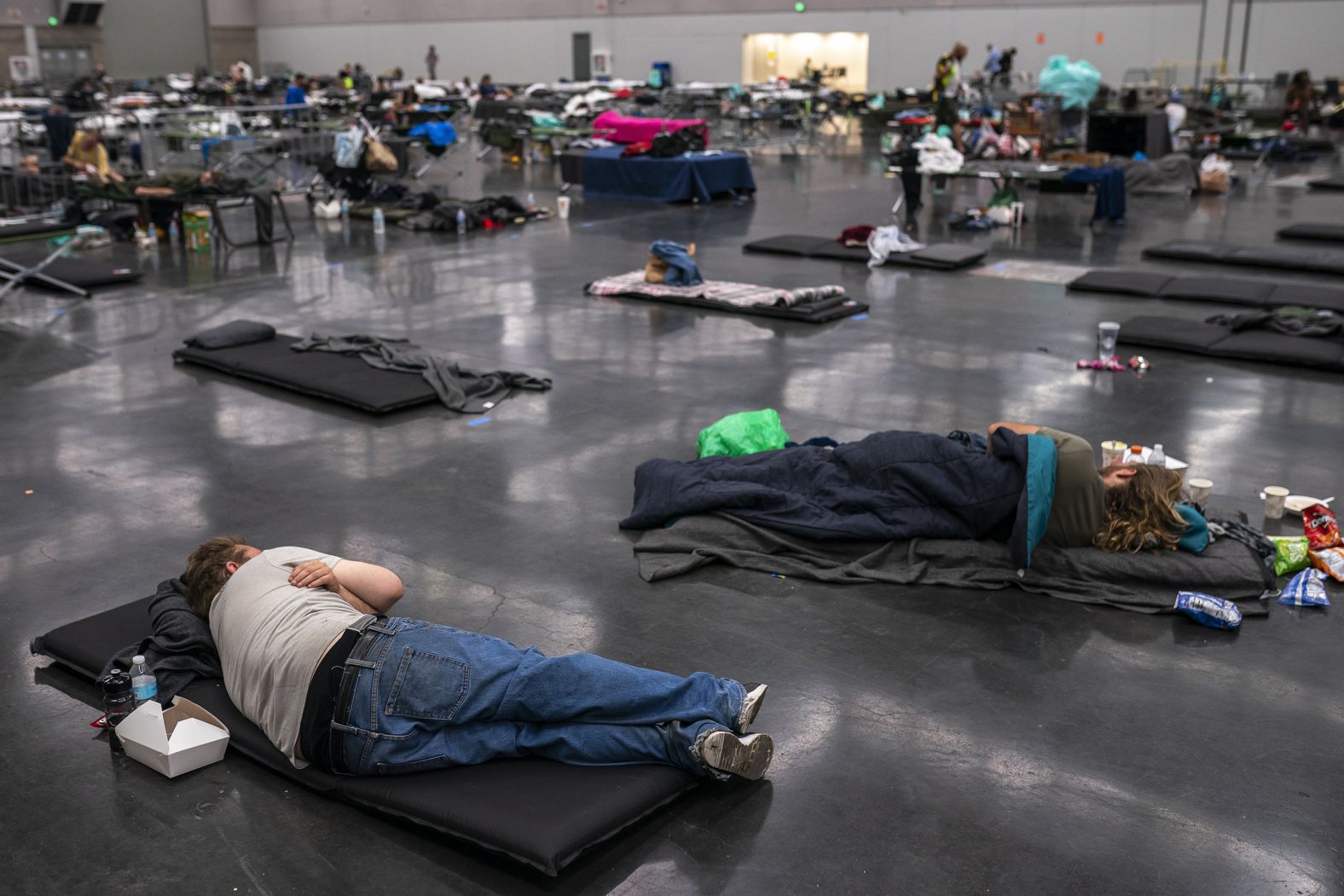 People in Portland, Oregon, cool off at the Oregon Convention Center on Sunday, June 27, 2021. Portland <a href="https://www.cnn.com/2021/06/28/weather/heat-waves-west-coast-records/index.html" target="_blank">set an all-time high of 112 degrees</a> that day. It surpassed it a day later with a high of 116.