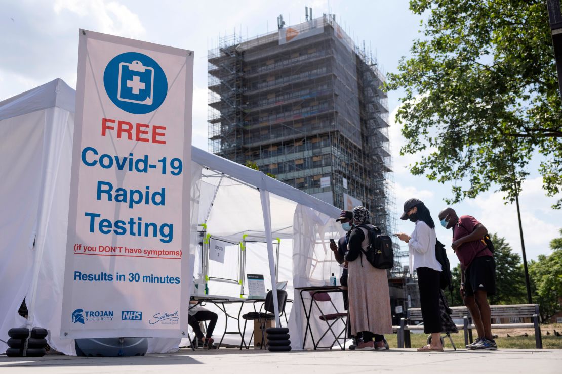 People line up for a rapid Covid-19 test in south London.