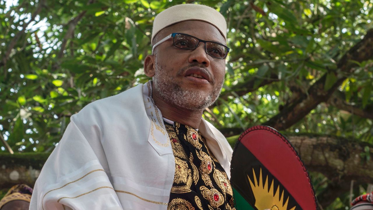 Political activist and leader of the Indigenous People of Biafra (IPOB) movement, Nnamdi Kanu (L), wearing a Jewish prayer shawl, speaks to veterans of the Nigerian civil war in his garden at his house in Umuahia, southeast Nigeria, on May 26, 2017, before commemoration of the 50th anniversary of the war on May 30. 
The war was triggered when the Igbo people, the main ethnic group in the southeast, declared an independent breakaway state, the Republic of Biafra.  / AFP PHOTO / STEFAN HEUNIS        (Photo credit should read STEFAN HEUNIS/AFP via Getty Images)