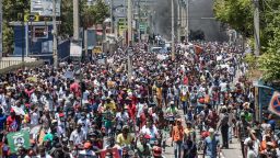 Haitians demonstrate during a protest to denounce the draft constitutional referendum carried by the President Jovenel Moise on March 28, 2021 in Port-au-Prince.