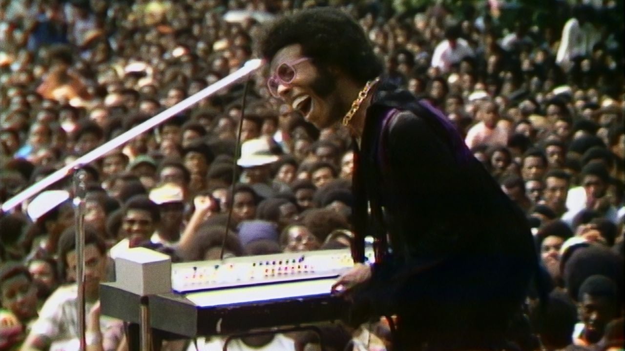 Sly Stone performs at the Harlem Cultural Festival in 1969, featured in the documentary 'Summer of Soul' (Courtesy of Searchlight Pictures).