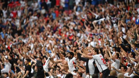 England supporters celebrate their win in the UEFA EURO 2020 round of 16 football match between England and Germany at Wembley Stadium.