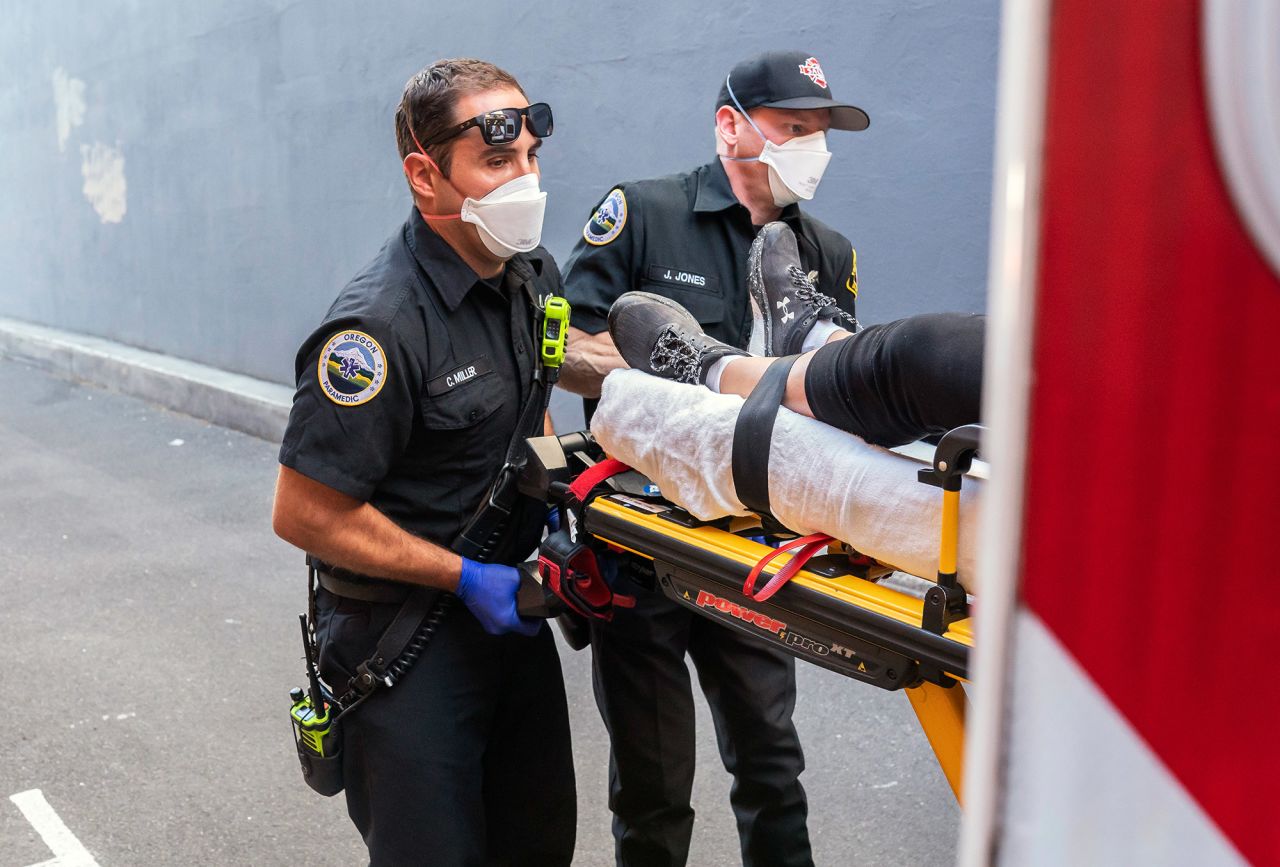 Paramedics respond to a heat-exposure call in Salem, Oregon, on Saturday.
