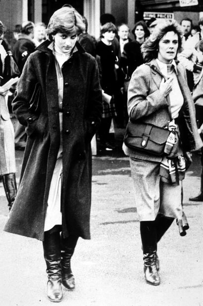 Diana and Camilla Parker-Bowles visit the Ludlow racecourse in October 1980, where Prince Charles was competing as a jockey. Diana and Charles would be engaged just a few months later. Prince Charles admitted in 1994 to a relationship with Parker-Bowles while still married to Diana; Charles and Camilla wed in 2005.