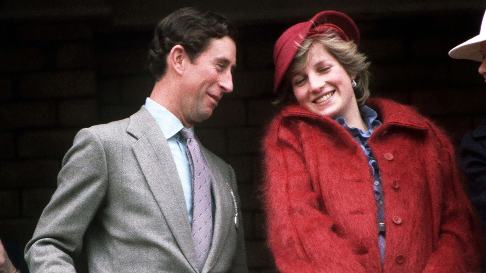 Charles and Diana attend the Grand National horse race in April 1982. 